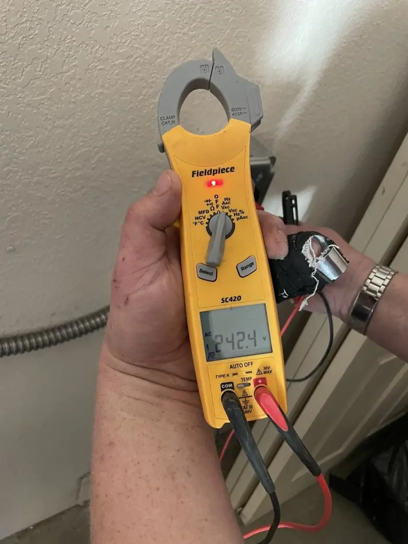 Voltage testing with clamp meter during Hot Tub / Pool Electrical Wiring in Hudson